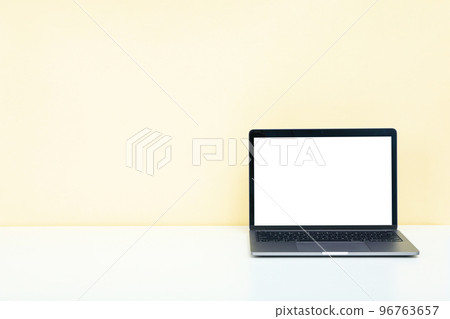 Laptop with blank screen on white table 96763657
