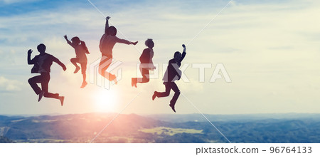 people jumping in front of nature people jumping in front of nature 96764133