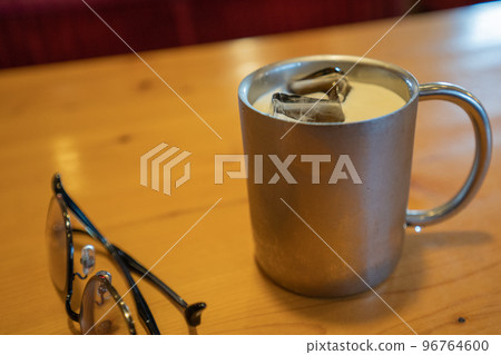 Iced coffee in a metal mug Iced coffee in a metal mug 96764600