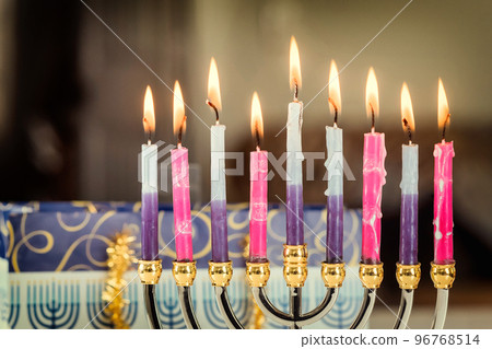 Colorful candles from a burning hanukkah candles in a menorah Selective soft focus 96768514