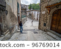 Walk in old streets of Scanno town in Italy 96769014