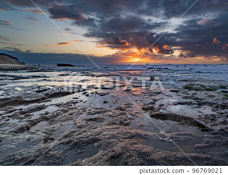 Colorful sunset on mediterranean coast Colorful sunset on mediterranean coast 96769021
