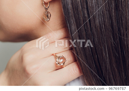close up of boho styled woman hands with silver jewelry. close up of boho styled woman hands with silver jewelry. 96769787