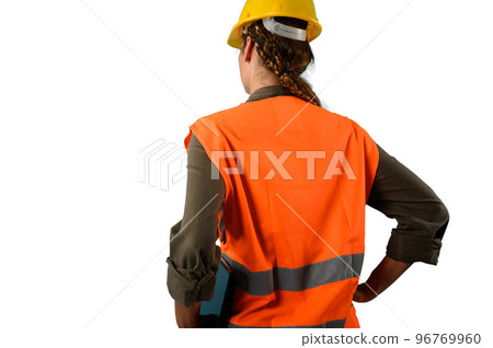 woman with helmet who work in a warehouse woman with helmet who work in a warehouse 96769960