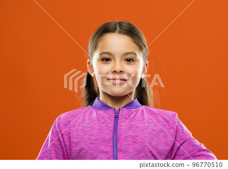 Girl active kid with long gorgeous hair. Strong and healthy hair concept. How to treat curly hair. Easy tips making hairstyle for kids. Comfortable hairstyle for active lifestyle. Charming beauty 96770510