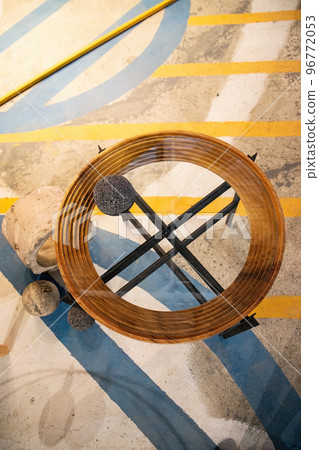 Double table in brown wood, with circular metal edges and several glass shelves. 96772053