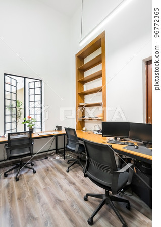modern designer desk for office, business and creative spaces, Wooden desk in black color with storage drawers. modern designer desk for office, business and creative spaces, Wooden desk in black color with storage drawers. 96772365