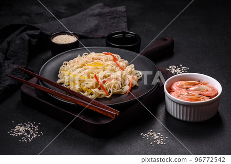 Delicious fresh rice noodles with shrimp, spices and herbs Delicious fresh rice noodles with shrimp, spices and herbs 96772542