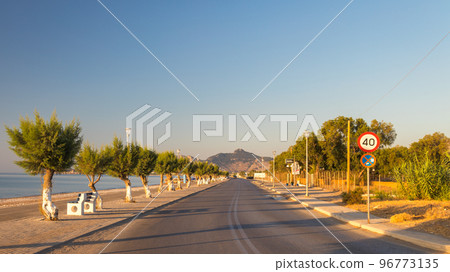 Afandou sea beach in Rhodes at sunrise of sunny summer day. Afandou sea beach in Rhodes at sunrise of sunny summer day. 96773135