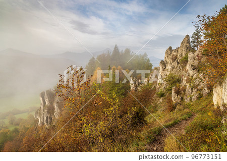Mountain rocky landscape in autumn foggy morning. 96773151