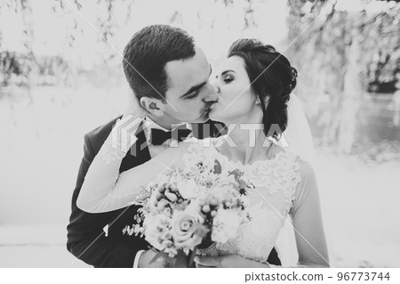 Close up of a nice young wedding couple Close up of a nice young wedding couple 96773744