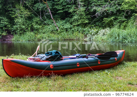 Canoeing trip on the river. Rafting in kayaks. Active recreation on the water. 96774624