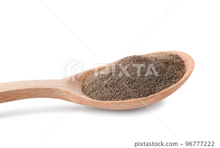 Spicy milled black pepper in wooden spoon isolated on white Spicy milled black pepper in wooden spoon isolated on white 96777222