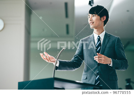 A man in his 30s taking the stage A man in his 30s taking the stage 96778555