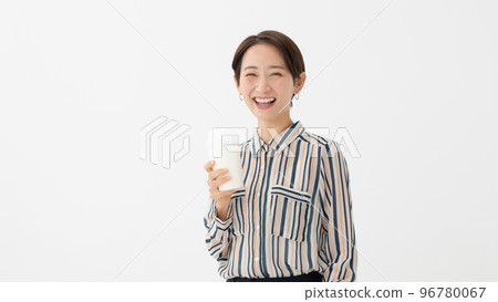 Woman drinking milk protein health 96780067