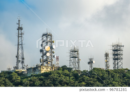Communication transmitter tower with antenna such a Mobile phone tower, Cellphone Tower, Phone Pole etc on the clear blue sky background with copy space. Communication transmitter tower with antenna such a Mobile phone tower, Cellphone Tower, Phone Pole etc on the clear blue sky background with copy space. 96781281