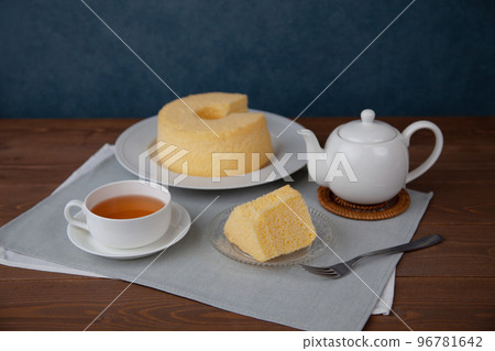 Chiffon cake and tea set wooden table 96781642