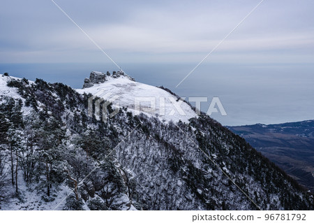 View on the top of Mount Alenga. Southern Demerdzhi in snow and ice in spring. Crimea View on the top of Mount Alenga. Southern Demerdzhi in snow and ice in spring. Crimea 96781792