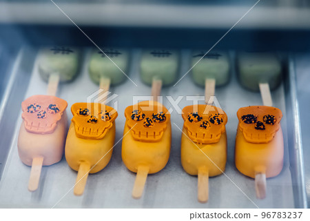 Tasty cookies for Halloween celebration in a shop window Tasty cookies for Halloween celebration in a shop window 96783237