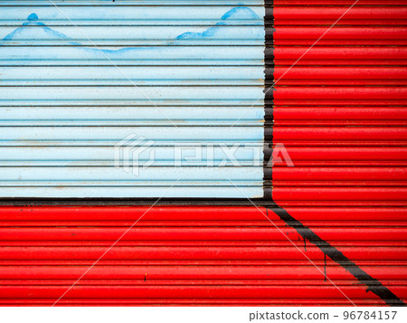 Colorful iron rolling door in red and blue Colorful iron rolling door in red and blue 96784157
