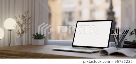 Modern minimal workspace with notebook laptop mockup, stationery and decor on wood table Modern minimal workspace with notebook laptop mockup, stationery and decor on wood table 96785225