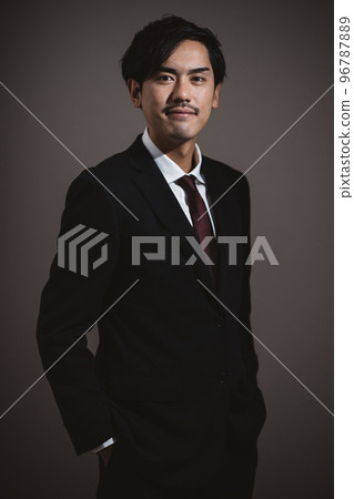 A man in a suit A man in a suit 96787889