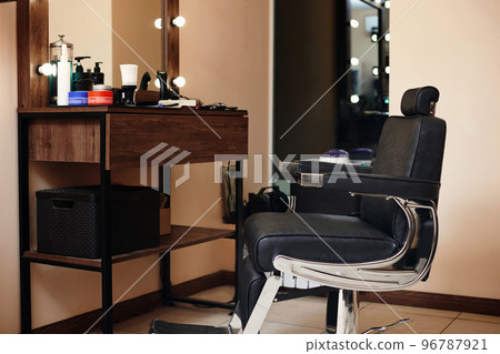 Client's stylish barber chair. barber shop interior Client's stylish barber chair. barber shop interior 96787921
