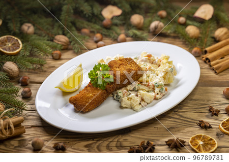 Christmas fried carp with potato salad 96789781
