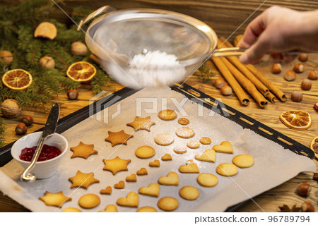 Christmas linzer cookies on the baking tray Christmas linzer cookies on the baking tray 96789794