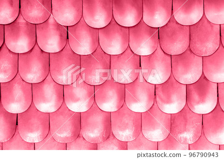 Close-up detail metallic texture pattern medieval replica steel chain scales plates knight armor s toned Color of the year 2023 Viva Magenta. Old metal body armour . Abstract chainmale dragon skin 96790943