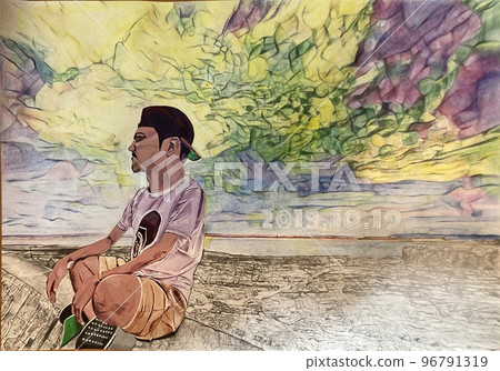 A young man standing on the coast of Okinawa 96791319
