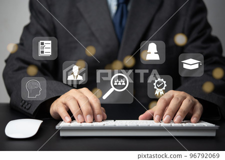 Human Resource Management HRM development and recruitment Job search concept. Businessman using computer and searching the information of education, qualification skills. 96792069