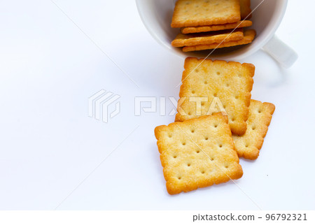 Dry cracker cookies on white background. Dry cracker cookies on white background. 96792321