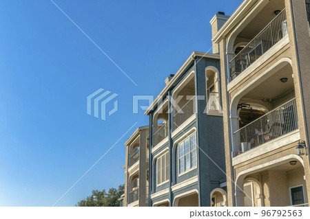 Austin, Texas- Residential building near Lake Austin with balconies against the sky 96792563
