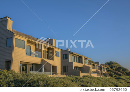 Houses with balconies against blue sky at scenic Del Mar Southern Califronia. Houses with balconies against blue sky at scenic Del Mar Southern Califronia. 96792660