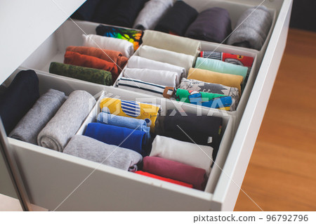 Vertical clothing storage ideas.  96792796