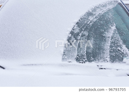 cleaning snow from the car cleaning snow from the car 96793705