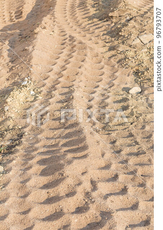 Wheel tracks on sand dirt Wheel tracks on sand dirt 96793707