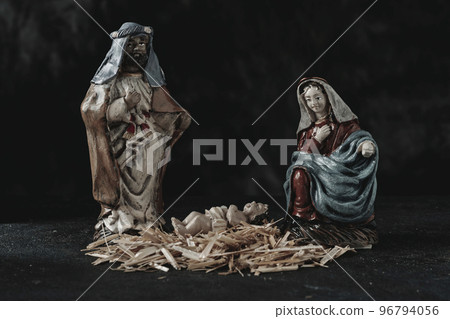 the holy family on a dark gray surface the holy family on a dark gray surface 96794056