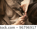 Womens fashion and style. Hair care, beauty industry concept. Hairdresser doing haircut closeup of 96796917