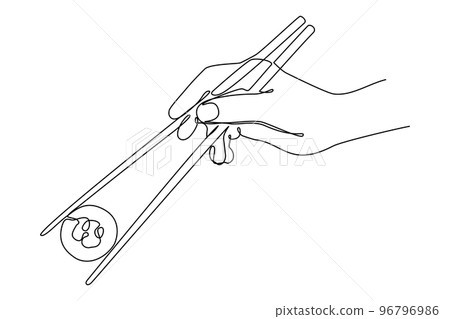 Hand with chopsticks holding sushi roll 96796986