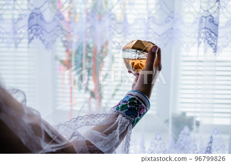 women's perfume in the hands of the bride women's perfume in the hands of the bride 96799826