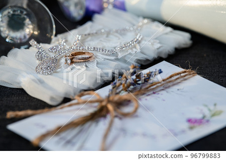 Wedding accessories. Wine glasses wedding invitation ring bride candle perfume sparkling wine Wedding accessories. Wine glasses wedding invitation ring bride candle perfume sparkling wine 96799883