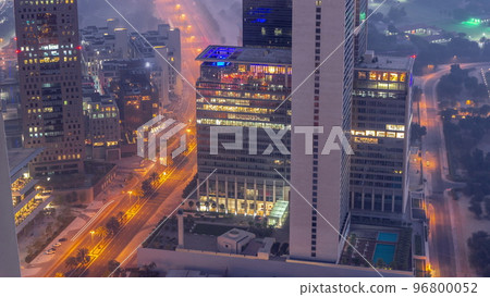 Office skyscrapers in financial district aerial night to day timelapse Office skyscrapers in financial district aerial night to day timelapse 96800052