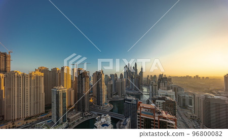 View of various skyscrapers in tallest recidential block in Dubai Marina aerial all day timelapse View of various skyscrapers in tallest recidential block in Dubai Marina aerial all day timelapse 96800082