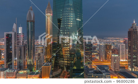 Financial center of Dubai city with luxury skyscrapers night to day timelapse, Dubai, United Arab Emirates 96800286
