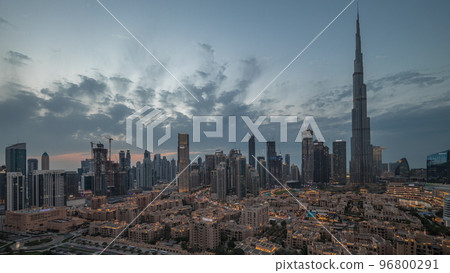 Dubai Downtown day to night transition timelapse with tallest skyscraper and other towers Dubai Downtown day to night transition timelapse with tallest skyscraper and other towers 96800291