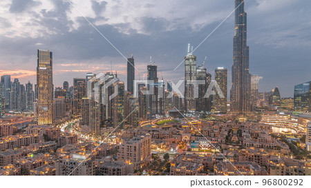 Dubai Downtown day to night transition timelapse with tallest skyscraper and other towers Dubai Downtown day to night transition timelapse with tallest skyscraper and other towers 96800292