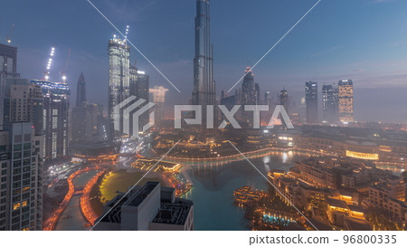Aerial view of Dubai city early morning during fog night to day timelapse. Aerial view of Dubai city early morning during fog night to day timelapse. 96800335