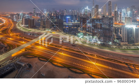 Panoramic skyline of Dubai with business bay and downtown district night to day timelapse. Panoramic skyline of Dubai with business bay and downtown district night to day timelapse. 96800349